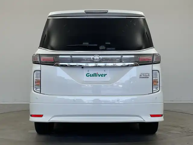 日産 エルグランド 250HWS S アーバンクロム 新潟県 2020(令2)年 6.9万km ブリリアントホワイトパール 純正ディーラーOPナビ（型式：MM519D-L）/・CD/DVD/Bluetooth/フルセグ/バックモニター/衝突被害軽減システム/レーダークルーズコントロ―ル/レーンキープアシスト/ドライブレコーダー/サンルーフ/両側パワースライドドア/3列シート/ハーフレザーシート/オットマン/電動リアゲート/純正フロアマット/ウォークスルー/純正LEDヘッドライト/オートライト/純正18インチAW夏タイヤ/ABS/横滑り防止機能/前後コーナーセンサー/盗難防止装置
