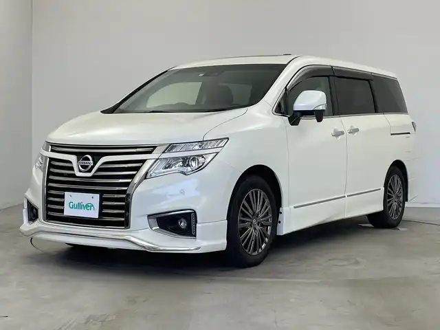 日産 エルグランド 250HWS S アーバンクロム 新潟県 2020(令2)年 6.9万km ブリリアントホワイトパール 純正ディーラーOPナビ（型式：MM519D-L）/・CD/DVD/Bluetooth/フルセグ/バックモニター/衝突被害軽減システム/レーダークルーズコントロ―ル/レーンキープアシスト/ドライブレコーダー/サンルーフ/両側パワースライドドア/3列シート/ハーフレザーシート/オットマン/電動リアゲート/純正フロアマット/ウォークスルー/純正LEDヘッドライト/オートライト/純正18インチAW夏タイヤ/ABS/横滑り防止機能/前後コーナーセンサー/盗難防止装置