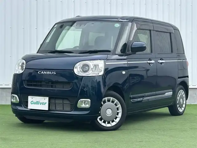 ダイハツ ムーヴ キャンバス セオリー G 香川県 2024(令6)年 0.7万km レーザーブルークリスタルシャイン 社外7インチSDナビ/→フルセグ/CD/DVD/Bluetooth/バックカメラ/スマートアシスト/・衝突警報/衝突回避支援ブレーキ/・ブレーキ制御付誤発進抑制機能/・車線逸脱警報/抑制機能/・ふらつき警報/・路側逸脱警報機能/・アダプティブドライビングビーム/・オートハイビーム/両側パワースライドドア/前席シートヒーター/LEDヘッドライト/LEDフォグランプ/電子パーキングブレーキ/オートブレーキホールド/ホッとカップホルダー/置きラクボックス/本革ステアリング/ステアリングリモコン/アイドリングストップ/プッシュスタート/スマートキー