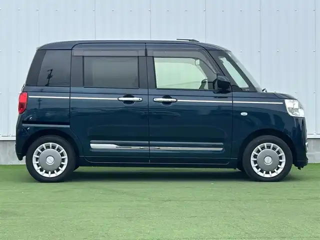 ダイハツ ムーヴ キャンバス セオリー G 香川県 2024(令6)年 0.7万km レーザーブルークリスタルシャイン 社外7インチSDナビ/→フルセグ/CD/DVD/Bluetooth/バックカメラ/スマートアシスト/・衝突警報/衝突回避支援ブレーキ/・ブレーキ制御付誤発進抑制機能/・車線逸脱警報/抑制機能/・ふらつき警報/・路側逸脱警報機能/・アダプティブドライビングビーム/・オートハイビーム/両側パワースライドドア/前席シートヒーター/LEDヘッドライト/LEDフォグランプ/電子パーキングブレーキ/オートブレーキホールド/ホッとカップホルダー/置きラクボックス/本革ステアリング/ステアリングリモコン/アイドリングストップ/プッシュスタート/スマートキー