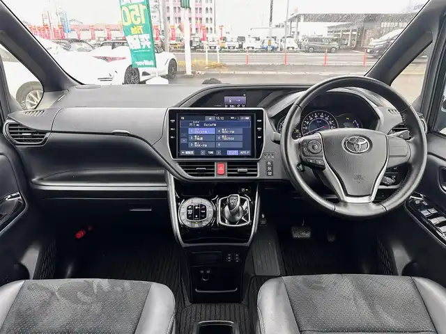 トヨタ ヴォクシー ハイブリッド ZS 煌Ⅲ 宮城県 2020(令2)年 5.8万km ブラック モデリスタエアロ（F/S/R）/マフラーカッター/セーフティセンス/・プリクラッシュセーフティ/・レーンディパーチャーアラート/・オートマチックハイビーム/・先行車発進告知機能/インテリジェントクリアランスソナー/純正10インチナビ（NSZN-Z68T）/・CD/DVD/・Bluetooth/・フルセグTV/・SD音楽録音機能/バックカメラ/ビルトインETC/ドライブレコーダー/両側パワースライドドア/ハーフレザーシート/シートヒーター/革巻きステアリング/クルーズコントロール/ステアリングスイッチ/LEDヘッドライト/フォグランプ/オートライト/スマートキー＆プッシュスタート/電動格納ミラー/純正16インチAW/フロアマット/Wエアバッグ