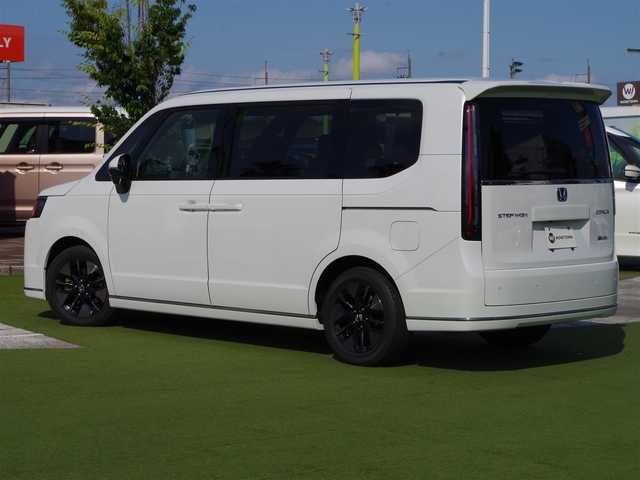 ホンダ ステップワゴン スパーダ eHEV 千葉県 2023(令5)年 2.7万km プラチナホワイトパール ホンダセンシング/・衝突軽減ブレーキ（CMBS）/・車線維持支援システム（LKAS）/・アダプティブクルーズコントロール（ACC）/・後方誤発進抑制機能/・誤発進抑制機能/パワーバックドア/両側パワースライドドア/純正メモリーナビ/地デジTV/【DVD/CD再生機能　Bluetooth接続】/バックカメラ/革巻きステアリング/ステアリングスイッチ/ハーフレザーシート/前席シートヒーター/ETC/LEDヘッドライト/フォグライト/ウインカーミラー/コーナーセンサー/純正16インチアルミホイル/サイド/カーテンエアバッグ/Honda スマートキー
