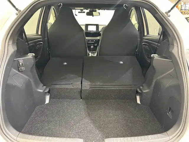 トヨタ ヤリス ハイブリッド X 愛媛県 2022(令4)年 1.9万km スーパーホワイトⅡ ・ナビ（ＢＴ・ａｐｐｌｅ　ｃａｒｐｌａｙ・ａｎｄｒｏｉｄ　ａｕｔｏ）/・バックカメラ　/・１００Ｖ充電　/・衝突軽減ブレーキ　　/・ＥＴＣ　/・前方ドラレコ　/・前後コーナーセンサー　/・オートマチックハイビーム