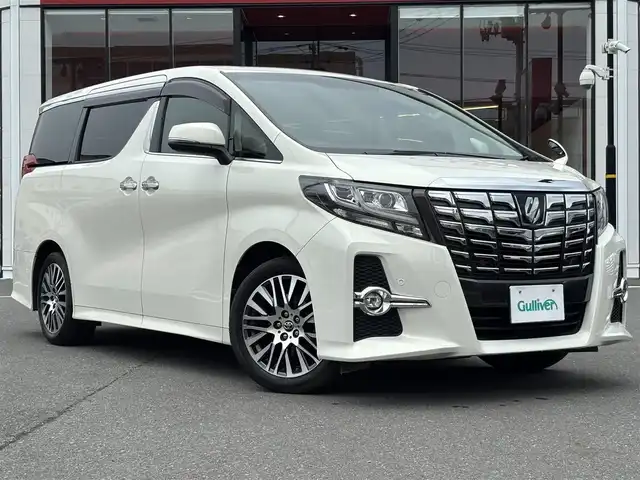 トヨタ アルファード S Cパッケージ 宮城県 2017(平29)年 5.7万km ラグジュアリーホワイトパールクリスタルシャインガラスフレーク 登録時走行距離56323km/純正ナビTV【フルセグTV/CD/DVD/AM/FM】/サンルーフ/オットマン/電動リアゲート/クリアランスソナー/後席モニター/ステアリングヒーター/AC100V電源/メモリーシート/ドアバイザー