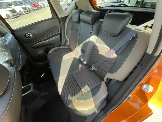 日産 ノート e－パワー メダリスト 愛媛県 2016(平28)年 3.7万km プレミアムコロナオレンジ エマージェンシーブレーキ/車線逸脱警報/純正ナビ（Bluetooth/フルセグTV/DVD再生）/アラウンドビューモニター/ハーフレザー/ETC/前方ドライブレコーダー/純正アルミホイール/純正フロアマット/前後コーナーセンサー/LEDヘッドライト/衝突被害軽減システム/横滑り防止装置