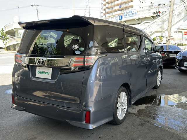 トヨタ ヴェルファイア Z Aエディション 京都府 2016(平28)年 7.2万km グレイッシュブルーマイカメタリック 純正SDナビ /（NSZT-Y64T)/フルセグTV/Bluetooth/CD再生機能/USB/両側パワースライドドア /純正11型フリップダウンモニター/オットマン/2列目ウォークスルー/衝突軽減　/Wサイドエアバッグ/カーテンエアバッグ/全方位カメラ　/禁煙車　/前後コーナーセンサー　/横滑り防止/盗難防止装置/LEDヘッドライト/フロントフォグランプ　/オートライト/クルコン追従有　/スマートキー　/前方ドラレコ　/純正AW18インチ