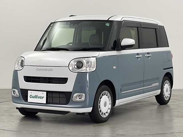 ダイハツ ムーヴ キャンバス ストライプス G 群馬県 2024(令6)年 0.3万km シャイニングホワイトパール/レイクブルーメタリック ナビ　バックカメラ　衝突被害軽減ブレーキ　両側電動スライドドア　カップヒーター　アイドリングストップ　ウェルカムオープン機能　シートヒーター　ステアリングリモコン　電動パーキングブレーキ　禁煙車