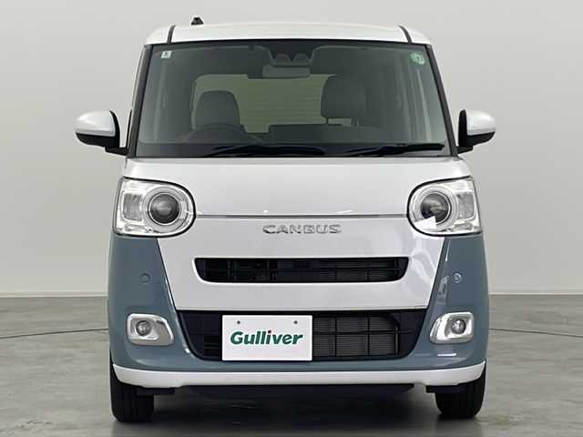 ダイハツ ムーヴ キャンバス ストライプス G 群馬県 2024(令6)年 0.3万km シャイニングホワイトパール/レイクブルーメタリック ナビ　バックカメラ　衝突被害軽減ブレーキ　両側電動スライドドア　カップヒーター　アイドリングストップ　ウェルカムオープン機能　シートヒーター　ステアリングリモコン　電動パーキングブレーキ　禁煙車