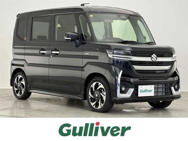 スズキ スペーシア カスタム HYBRID XS 滋賀県 2023(令5)年 0.1千km ブルーイッシュブラックパール3 純正9インチメモリーナビ/【Bluetooth/フルセグTV/CD/DVD//AppleCarPlay/AndroidAuto】/全方位モニター/両側パワースライドドア/スズキセーフティサポート/・デュアルセンサーブレーキサポート２/・誤発進抑制機能/・低速時ブレーキサポート/・車線逸脱警報機能/・車線維持支援機能/・アダプティブクルーズコントロール/・標識認識機能/・車線逸脱抑制機能/・ふらつき警報機能/・発進お知らせ機能/・ハイビームアシスト/LEDヘッドランプ/ヘッドアップディスプレイ/ハーフレザー/シートヒーター/ステアリングヒーター/オットマン