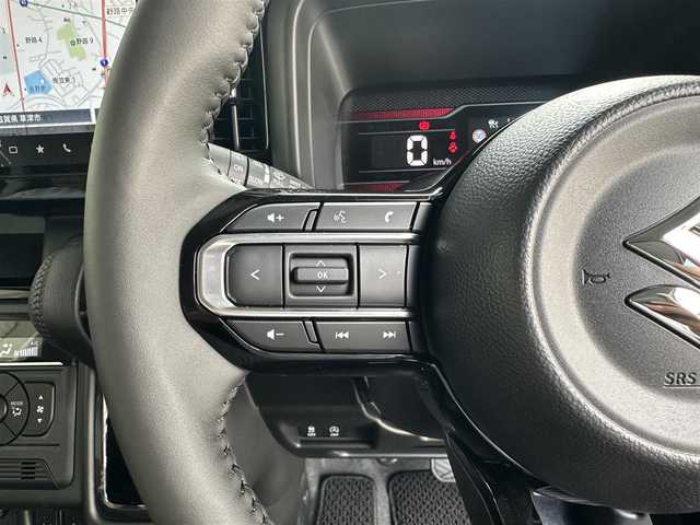 スズキ スペーシア カスタム HYBRID XS 滋賀県 2023(令5)年 0.1千km ブルーイッシュブラックパール3 純正9インチメモリーナビ/【Bluetooth/フルセグTV/CD/DVD//AppleCarPlay/AndroidAuto】/全方位モニター/両側パワースライドドア/スズキセーフティサポート/・デュアルセンサーブレーキサポート２/・誤発進抑制機能/・低速時ブレーキサポート/・車線逸脱警報機能/・車線維持支援機能/・アダプティブクルーズコントロール/・標識認識機能/・車線逸脱抑制機能/・ふらつき警報機能/・発進お知らせ機能/・ハイビームアシスト/LEDヘッドランプ/ヘッドアップディスプレイ/ハーフレザー/シートヒーター/ステアリングヒーター/オットマン