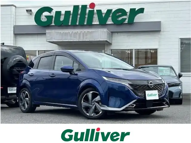 日産 オーラ G レザーエディション 三重県 2022(令4)年 2.8万km オーロラフレアブルーパール 全方位運転支援システム/・インテリジェントエマージェンシーブレーキ/・踏み間違い衝突防止アシスト/・標識検知機能/・前方衝突予測警報/・車線逸脱警報/・ふらつき警報/・車線逸脱防止支援システム/・エマージェンシーストップシグナル/・後側方衝突防止支援システム/・後側方車両検知警報/・後退時車両検知機能/プロパイロット/SOSコール/インテリジェントアラウンドビューモニター/インテリジェントルームミラー/1オーナー/BOSEパーソナルプラスサウンドシステム/メーカーオプション9型ナビ/フルセグTV/【Bluetooth/USB/スマホ連携/HDMI】/ビルトインETC2.0/ドライブレコーダー/ワイヤレス充電/レザーシート/D/N席シートヒーター/ステアリングヒーター/寒冷地仕様/アダプティブLEDヘッドランプ/インテリジェントオートライト/205/50R17インチ純正AW/プッシュスタート/スマートキー/スペアキー/純正フロアマット