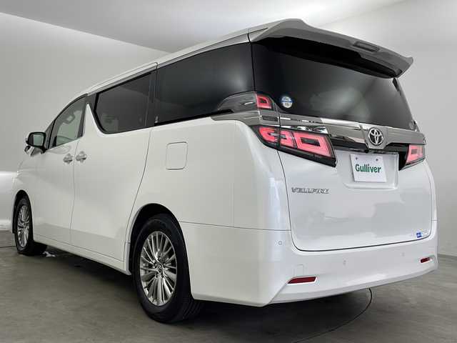トヨタ ヴェルファイア V 兵庫県 2019(平31)年 4万km ホワイトパールクリスタルシャイン ・純正9インチナビ（CD/DVD/TV/BT/SD)/・両側パワースライドドア/・プリクラッシュセーフティ/・レーダークルーズコントロール/・クリアランスソナー/・オートマチックハイビーム/・レーントレーシングアシスト/・パーキングサポートブレーキ/・ロードサインアシスト/・先行者発進告知/・LEDヘッドライト/・パワーバックドア/・レザーシート/・シートヒーター/・シートベンチレーション/・パワーシート/・シートメモリー/・オットマン/・ビルトインETC2.0/・ドライブレコーダー/・ナノイー/・バックカメラ/・フロントカメラ/・純正１７インチAW/・プッシュスタート/・スペアキー/・自動防眩ミラー/・ステアリングリモコン