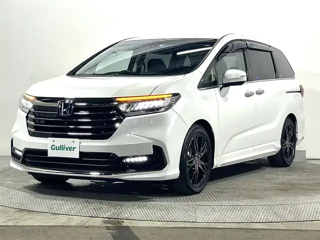ホンダ オデッセイ ハイブリッド e:HEVアブソルート EX 大阪府 2022(令4)年 1.3万km プラチナホワイトパール 純正ナビ（フルセグ／ＤＶＤ／ＣＤ／Ｂｌｕｅｔｏｏｔｈ）　３６０カメラ　ホンダセンシング　衝突軽減　レーンアシスト　電動リアゲート　両側電動ドア　リアオートエアコン　レーダークルーズ　ＡＣ１００Ｖ
