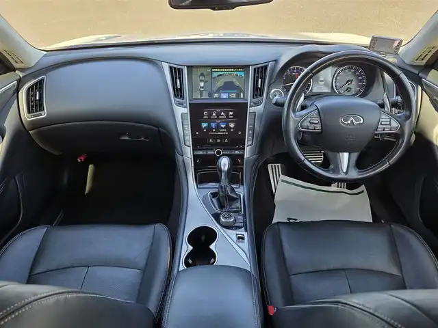 日産 スカイライン 200GT－t タイプSP 鹿児島県 2015(平27)年 6.7万km クリスタルホワイトパール インフィニティＱ６０用純正２０インチアルミホイール　/ムーンルーフ　/社外レーダー　/Ｄ＋Ｎ席シートヒーター　/Ｄ＋Ｎ席パワーシート　/ＮｉｓｓａｎＣｏｎｎｅｃｔ　/アラウンドビューモニター/インテリジェントクルーズコントロール/前後純正エアロスプラッシュ/シートメモリー/Bluetoothオーディオ/ビルトインETC/フルセグテレビ/パドルシフト/ＭＴモード付きＡＴ/横滑り防止装置/レーンキープアシスト/プッシュスタート/スマートキー/エアバック(W+サイド)/カーテンエアバッグ