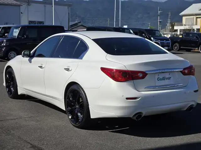 日産 スカイライン 200GT－t タイプSP 鹿児島県 2015(平27)年 6.7万km クリスタルホワイトパール インフィニティＱ６０用純正２０インチアルミホイール　/ムーンルーフ　/社外レーダー　/Ｄ＋Ｎ席シートヒーター　/Ｄ＋Ｎ席パワーシート　/ＮｉｓｓａｎＣｏｎｎｅｃｔ　/アラウンドビューモニター/インテリジェントクルーズコントロール/前後純正エアロスプラッシュ/シートメモリー/Bluetoothオーディオ/ビルトインETC/フルセグテレビ/パドルシフト/ＭＴモード付きＡＴ/横滑り防止装置/レーンキープアシスト/プッシュスタート/スマートキー/エアバック(W+サイド)/カーテンエアバッグ