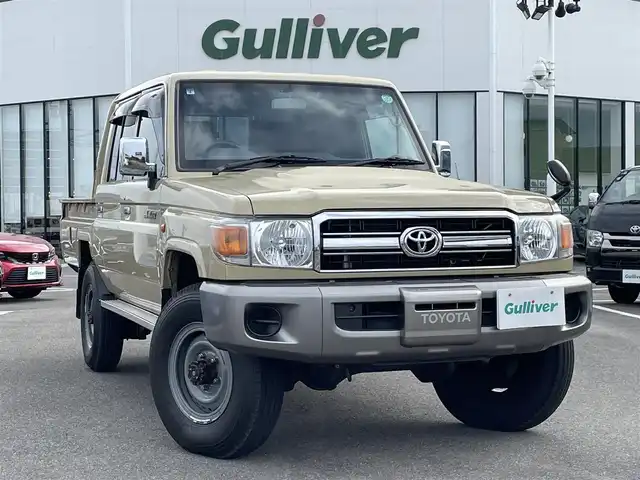 トヨタ ランドクルーザー 長崎県 2015(平27)年 2.4万km ベージュ 社外ディスプレイオーディオ/バックカメラ/革調ブラウンシートカバー/ドライブレコーダー/LEDヘッドライト/ETC