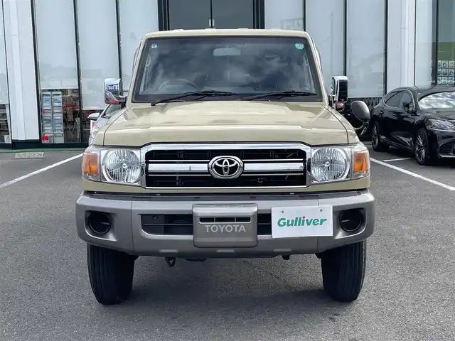 トヨタ ランドクルーザー 長崎県 2015(平27)年 2.4万km ベージュ 社外ディスプレイオーディオ/バックカメラ/革調ブラウンシートカバー/ドライブレコーダー/LEDヘッドライト/ETC