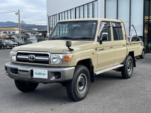 トヨタ ランドクルーザー 長崎県 2015(平27)年 2.4万km ベージュ 社外ディスプレイオーディオ/バックカメラ/革調ブラウンシートカバー/ドライブレコーダー/LEDヘッドライト/ETC