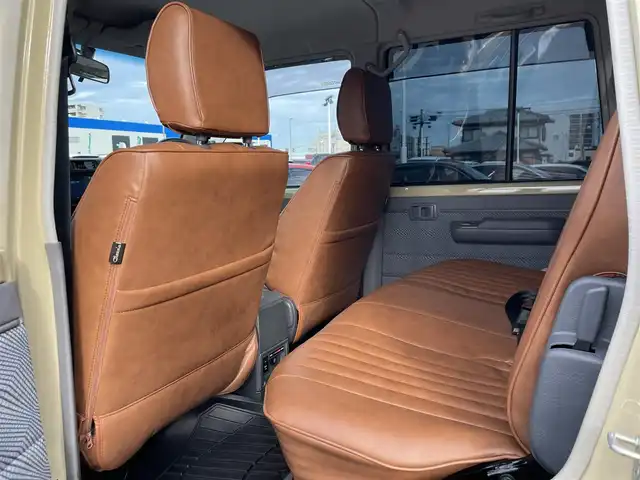 トヨタ ランドクルーザー 長崎県 2015(平27)年 2.4万km ベージュ 社外ディスプレイオーディオ/バックカメラ/革調ブラウンシートカバー/ドライブレコーダー/LEDヘッドライト/ETC