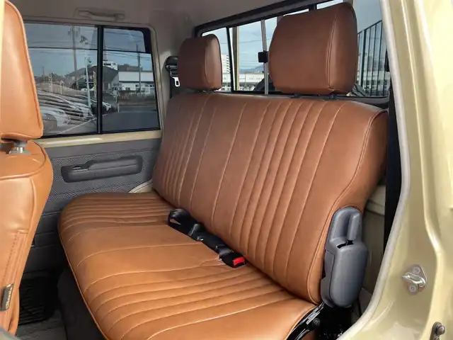 トヨタ ランドクルーザー 長崎県 2015(平27)年 2.4万km ベージュ 社外ディスプレイオーディオ/バックカメラ/革調ブラウンシートカバー/ドライブレコーダー/LEDヘッドライト/ETC