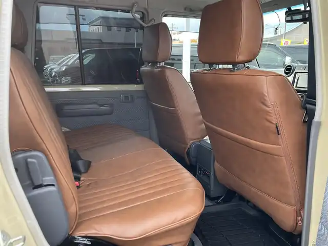 トヨタ ランドクルーザー 長崎県 2015(平27)年 2.4万km ベージュ 社外ディスプレイオーディオ/バックカメラ/革調ブラウンシートカバー/ドライブレコーダー/LEDヘッドライト/ETC