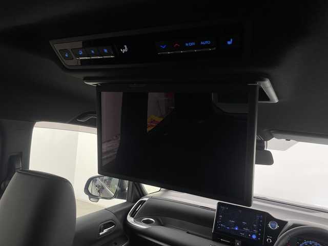 トヨタ ヴォクシー ハイブリッド S－Z 埼玉県 2023(令5)年 2.5万km アティチュードブラックマイカ トヨタセーフティセンス/純正10.5インチナビ機能付きディスプレイオーディオ/CD/DVD/Bluetooth/フルセグ//バックカメラ/13.2型有機EL後席ディスプレイ/両側パワースライドドア/前後ドライブレコーダー/ハーフレザーシート/1列目・2列目シートヒーター/オットマン/電動リアゲート/純正１７インチアルミホイール/プッシュスタート/スマートキー/スペアキー１本