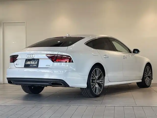 アウディ Ａ７ SB 2．0 TFSI クワトロ 愛知県 2015(平27)年 5.5万km グレイシアホワイトメタリック 純正ＯＰホイール　/茶革シート　/ＢＯＳＥサウンド　/アシスタンスＰＫＧ　/マトリクスＬＥＤ　/アウディサイドアシスト/アウディアクティブレーンアシスト　/アダプティブクルーズコントロール　/ＭＭＩナビゲーション/Bluetooth/バックカメラ/フルセグTV/パワーバックドア/パワーシート/ETC/プッシュスタート/ウィンカーミラー/アイドリングストップ