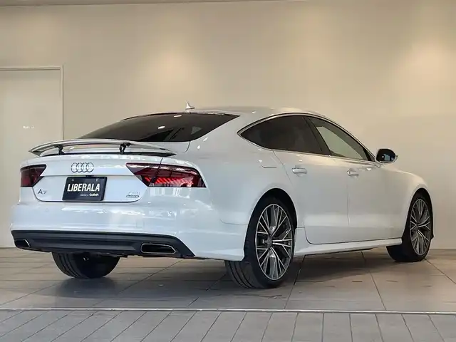 アウディ Ａ７ SB 2．0 TFSI クワトロ 愛知県 2015(平27)年 5.5万km グレイシアホワイトメタリック 純正ＯＰホイール　/茶革シート　/ＢＯＳＥサウンド　/アシスタンスＰＫＧ　/マトリクスＬＥＤ　/アウディサイドアシスト/アウディアクティブレーンアシスト　/アダプティブクルーズコントロール　/ＭＭＩナビゲーション/Bluetooth/バックカメラ/フルセグTV/パワーバックドア/パワーシート/ETC/プッシュスタート/ウィンカーミラー/アイドリングストップ