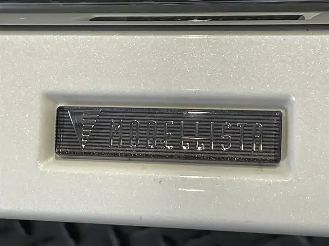 トヨタ ノア ハイブリッド S－Z 愛知県 2024(令6)年 1.7万km ホワイトパールクリスタルシャイン 純正１０．５インチディスプレイオーディオＰｌｕｓ　/（AM/FM/フルセグTV/CarPlay/Miracast/CD・DVD再生）/CD・DVDデッキ/純正フリップダウンモニター　/モデリスタフルエアロ　/快適利便パッケージ　/　　ハンズフリー両側パワースライドドア/　　パワーバックドア/　　ステアリングヒーター/　　キャプテンシート/　　シートヒーター・オットマン/ＡＣ１００Ｖ　/トヨタセーフティセンス　/　　プリクラッシュセーフティ/　　レーントレーニングアシスト＋レーンディパーチャーアラート/　　レーダークルーズコントロール（ACC)/　　オートマチックハイビーム/　　ロードサインアシスト/　　発進遅れ告知機能/ブラインドスポットモニター/デジタルインナーミラー　/クリアランスソナー/ビルトインETC2.0/前後ドライブレコーダー/バックカメラ/LEDヘッドライト/LEDフォグランプ/ヒッチメンバー