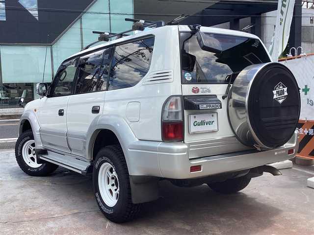 トヨタ ランドクルーザー プラド TX－LTD ワイド 京都府 2001(平13)年 17.8万km ホワイト/シルバーM ワンオーナー/3.0Ｌディーゼルターボ４ＷＤ/電動サンルーフ/ルーフレール/寒冷地仕様/　 ２バッテリー/リアヒーター/社外ルーフキャリア/背面タイヤ/ＲＡＹＳ16インチアルミ/社外メモリーナビ/　 CD DVD BT SD フルセグＴＶ/ETC/サイドステップ/社外ＬＥＤヘッドライト/社外ＬＥＤフォグ/キーレスエントリー/アクティブＴＲＣ/マルチインフォメーション/アイドルＵＰ/スペアキー/新車保証書/取扱説明書