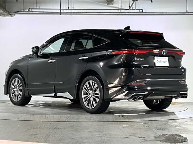 トヨタ ハリアー ハイブリッド Z レザーパッケージ 広島県 2024(令6)年 1.1万km プレシャスブラックパール 後期型/禁煙車/モデリスタエアロ（F/S/R）/モデリスタシグネチャーイルミグリル/トヨタセーフティセンス/・プリクラッシュセーフティ/・レーンディパーチャーアラート/・LTA/・先行車発進告知/・RSA/・レーダークルーズコントロール/クリアランスソナー/HUD/BSM/デジタルインナーミラー/JBLプレミアムサウンド/純正12.3インチナビ/・フルセグ/Bluetooth/USB/パノラミックビューモニター/ステアリングヒーター/革巻きステアリング/ステアリングスイッチ/黒革シート/シートヒーター/ベンチレーション/パワーシート/シートメモリー/LEDヘッドライト/ETC2.0/AC100V1500W電源（トランク）/純正ドアバイザー/純正フロアマット/純正19インチアルミホイール/W+サイド+カーテンエアバック