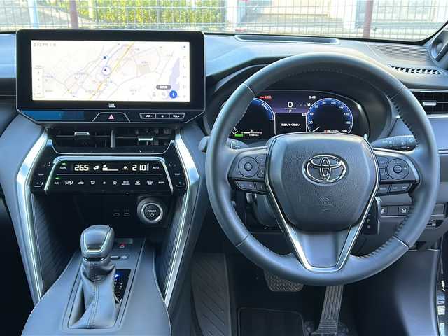 トヨタ ハリアー ハイブリッド Z レザーパッケージ 広島県 2024(令6)年 1.1万km プレシャスブラックパール 後期型/禁煙車/モデリスタエアロ（F/S/R）/モデリスタシグネチャーイルミグリル/トヨタセーフティセンス/・プリクラッシュセーフティ/・レーンディパーチャーアラート/・LTA/・先行車発進告知/・RSA/・レーダークルーズコントロール/クリアランスソナー/HUD/BSM/デジタルインナーミラー/JBLプレミアムサウンド/純正12.3インチナビ/・フルセグ/Bluetooth/USB/パノラミックビューモニター/ステアリングヒーター/革巻きステアリング/ステアリングスイッチ/黒革シート/シートヒーター/ベンチレーション/パワーシート/シートメモリー/LEDヘッドライト/ETC2.0/AC100V1500W電源（トランク）/純正ドアバイザー/純正フロアマット/純正19インチアルミホイール/W+サイド+カーテンエアバック