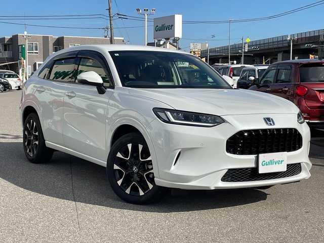 ホンダ ＺＲ－Ｖ ハイブリッド e:HEV Z 石川県 2024(令6)年 1万km プラチナホワイトパール ４ＷＤ　純正９型ナビ　フルセグＴＶ　全方位カメラ　ＬＥＤヘッドライト　ＥＴＣ　革シート　ドラレコ　ＢＯＳＥサウンド　レーダークルーズ　パワーバックドア　ＢＳＭ　ホンダセンシング　純正アルミホイール