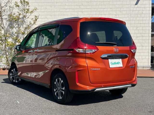 ホンダ フリード ハイブリット クロスター ホンダセンシング 茨城県 2020(令2)年 4.4万km プレミアムクリスタルオレンジM 社外ナビ/純正AW/両側パワースライドドア/バックカメラ/ETC/オートクルーズコントロール/ドライブレコーダー/フルセグ/LED/ワイパーデアイサー/ハーフレザー/スマートキー/フォグランプ/オートライト/シートヒーター/レーンキープ