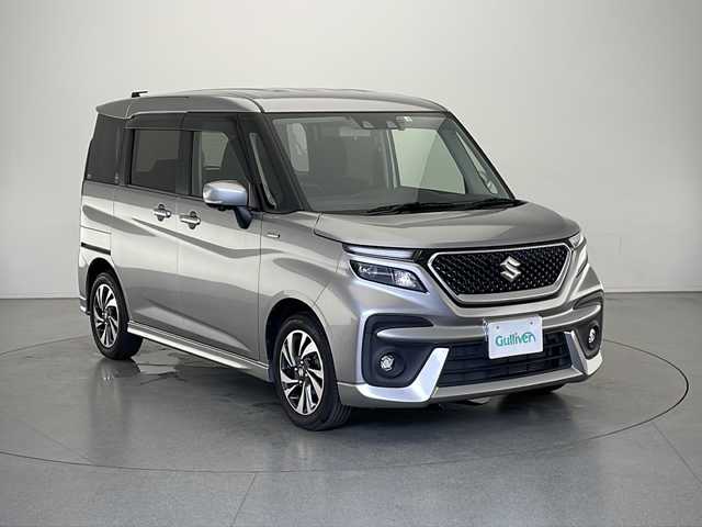 スズキ ソリオ バンディット HV MV 長野県 2022(令4)年 5万km グレー ワンオーナー/4WD/デュアルカメラブレーキサポート/純正10インチナビ(フルセグ/DVD/CD/BT)/全方位カメラ/両側パワースライド/純正前後ドライブレコーダー/ＥＴＣ/ヘットアップディスプレイ/リアコーナーセンサー/LEDヘットライト/フォグランプ/リアサーキュレーター/リアサイドサンシェード/ステリングスイッチ/ドアバイザー/オートマチックハイビーム/純正フロアマット/スペアーキー/純正15インチAW/保証書