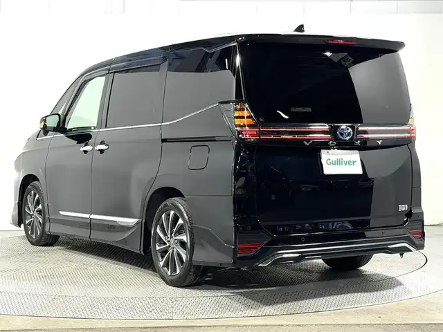 トヨタ ヴォクシー ハイブリッド S－Z 大阪府 2023(令5)年 3.2万km アティチュードブラックマイカ モデリスタエアロ 純正10.5incナビTV バックカメラ フリップダウンモニター シートヒーター レーダークルコン 衝突軽減ブレーキ レーンアシスト オートハイビーム 両側パワースライドドア 100V電源 ETC