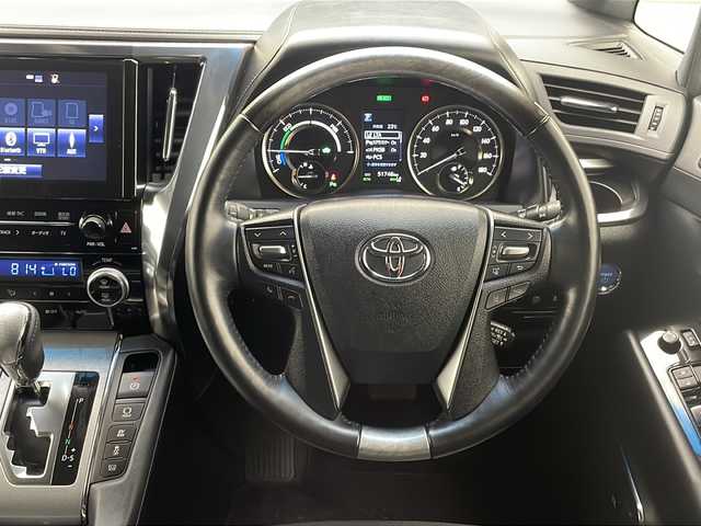 トヨタ アルファードハイブリット エグゼクティブ ラウンジ S 沖縄県 2019(令1)年 5.2万km ブラック 純正10.5型ナビ＋JBLサウンドシステム/　Blu-ray/CD/DVD/SD/USB/BT/フルセグ/パノラミックビューモニター/純正13.3型フリップダウンモニター/デジタルインナーミラー/ビルトインETC2.0 /純正ドライブレコーダー（DRT-H68A）/両側パワースライドドア　/パワーバックドア/トヨタセーフティセンス/ブラインドスポットモニター/リヤクロストラフィックオートブレーキ/インテリジェントクリアランスソナー/本革シート/1・2列目パワーシート/1・2列目シートエアコン・シートヒーター/ステアリングヒーター/純正17インチAW/スペアタイヤ（MOP）/純正フロアマット/プッシュスタート/スマートキ―/スペアキー/保証書・取扱説明書