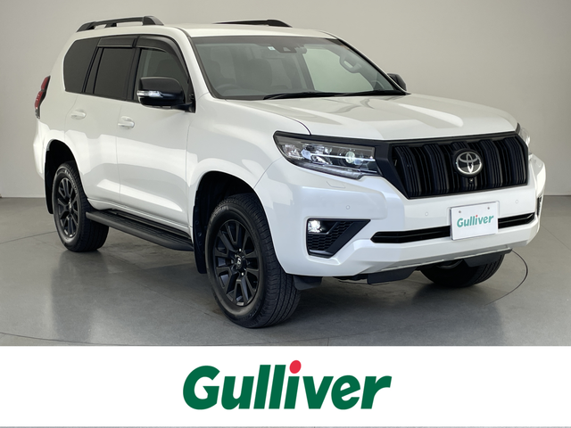 トヨタ ランドクルーザー プラド TX Lパッケージ マットブラED 愛知県 2023(令5)年 1.8万km ホワイトパールクリスタルシャイン 純正メーカー９型ナビ　フルセグＴＶ　Ｂｌｕｅｔｏｏｔｈ　トヨタセーフティーセンス　パノラミックビューモニター　黒革　パワーシート　シートエアコン　レーダークルコン　衝突軽減　ルーフレール　ＥＴＣ2.0　ＬＥＤオートライト　禁煙車