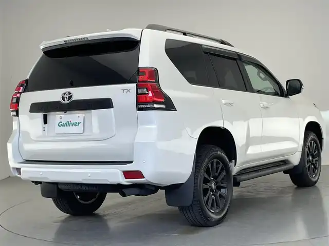 トヨタ ランドクルーザー プラド TX Lパッケージ マットブラED 愛知県 2023(令5)年 1.8万km ホワイトパールクリスタルシャイン 純正メーカー９型ナビ　フルセグＴＶ　Ｂｌｕｅｔｏｏｔｈ　トヨタセーフティーセンス　パノラミックビューモニター　黒革　パワーシート　シートエアコン　レーダークルコン　衝突軽減　ルーフレール　ＥＴＣ2.0　ＬＥＤオートライト　禁煙車