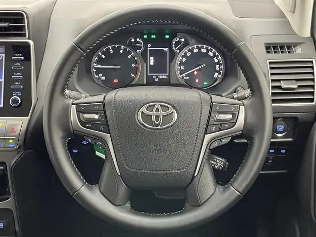 トヨタ ランドクルーザー プラド TX Lパッケージ マットブラED 愛知県 2023(令5)年 1.8万km ホワイトパールクリスタルシャイン 純正メーカー９型ナビ　フルセグＴＶ　Ｂｌｕｅｔｏｏｔｈ　トヨタセーフティーセンス　パノラミックビューモニター　黒革　パワーシート　シートエアコン　レーダークルコン　衝突軽減　ルーフレール　ＥＴＣ2.0　ＬＥＤオートライト　禁煙車