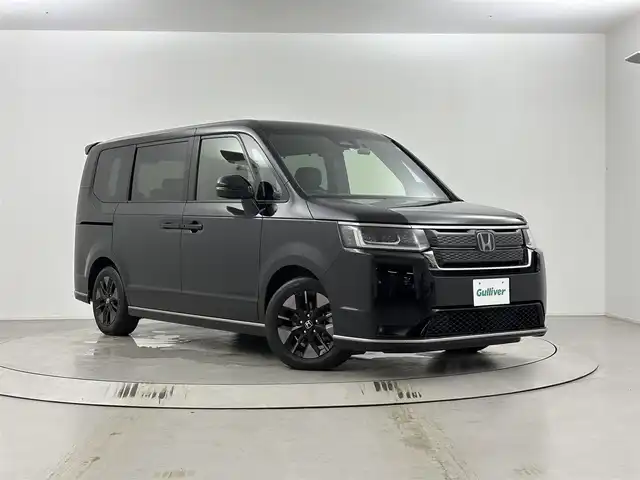 ホンダ ステップワゴン スパーダ eHEV 埼玉県 2023(令5)年 2.2万km クリスタルブラックパール 純正ナビ（Bluetooth/CD/DVD/AM/FM）/フルセグTV/バックカメラ/レーダークルーズコントロール/ブラインドスポットモニター/横滑り防止装置/レーンキープアシスト/盗難防止装置/衝突軽減システム/LEDヘッドライト/パドルシフト/両側パワースライドドア/ETC/ドライブレコーダー/スマートキー