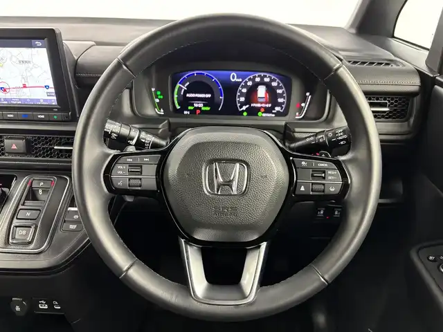 ホンダ ステップワゴン スパーダ eHEV 埼玉県 2023(令5)年 2.2万km クリスタルブラックパール 純正ナビ（Bluetooth/CD/DVD/AM/FM）/フルセグTV/バックカメラ/レーダークルーズコントロール/ブラインドスポットモニター/横滑り防止装置/レーンキープアシスト/盗難防止装置/衝突軽減システム/LEDヘッドライト/パドルシフト/両側パワースライドドア/ETC/ドライブレコーダー/スマートキー