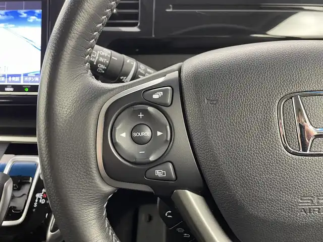 ホンダ ステップワゴン スパーダ ハイブリッド G EX ホンダセンシング 熊本県 2018(平30)年 6.7万km モダンスティールM 純正９インチナビVXM-187VFNi（ＣＤ・ＤＶＤ・フルセグ・ＢＴ・ＳＤ・ＵＳＢ）/バックカメラ　/社外前方ドライブレコーダー　/ビルトインＥＴＣ　/両側パワースライドドア　/前席シートヒーター　/ホンダセンシング/・衝突軽減ブレーキ/・アダブティブクルーズコントロール/・オートハイビーム/・先行車発進お知らせ機能/・路外逸脱制御/・レーンキープアシスト/・標識認識機能/横滑り防止/電動パーキング/ブレーキホールド/ハーフレザーシート/純正フロアマット/純正16インチAW/オートライト/LEDヘッドライト/フォグランプ/スマートキー/プッシュスタート/保証書