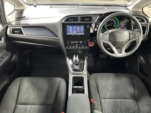 ホンダ シャトル ハイブリッド ホンダセンシング 大阪府 2020(令2)年 2.8万km ルナシルバーM 社外ナビ　衝突軽減ブレーキ　レーンアシスト　レーダークルーズコントロール　スマートキー　プッシュスタート　オートエアコン　ビルトインＥＴＣ　電動格納ミラー　Ｂｌｕｅｔｏｏｔｈ　横滑り防止装置　ｅｃｏｎ