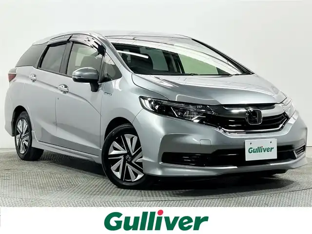 ホンダ シャトル ハイブリッド ホンダセンシング 大阪府 2020(令2)年 2.8万km ルナシルバーM 社外ナビ　衝突軽減ブレーキ　レーンアシスト　レーダークルーズコントロール　スマートキー　プッシュスタート　オートエアコン　ビルトインＥＴＣ　電動格納ミラー　Ｂｌｕｅｔｏｏｔｈ　横滑り防止装置　ｅｃｏｎ