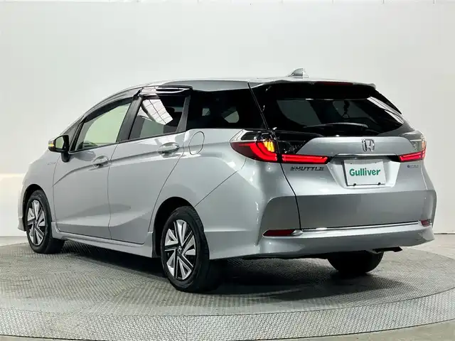 ホンダ シャトル ハイブリッド ホンダセンシング 大阪府 2020(令2)年 2.8万km ルナシルバーM 社外ナビ　衝突軽減ブレーキ　レーンアシスト　レーダークルーズコントロール　スマートキー　プッシュスタート　オートエアコン　ビルトインＥＴＣ　電動格納ミラー　Ｂｌｕｅｔｏｏｔｈ　横滑り防止装置　ｅｃｏｎ