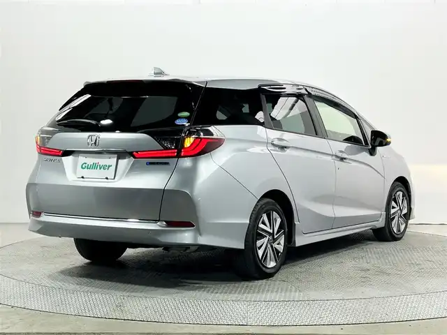ホンダ シャトル ハイブリッド ホンダセンシング 大阪府 2020(令2)年 2.8万km ルナシルバーM 社外ナビ　衝突軽減ブレーキ　レーンアシスト　レーダークルーズコントロール　スマートキー　プッシュスタート　オートエアコン　ビルトインＥＴＣ　電動格納ミラー　Ｂｌｕｅｔｏｏｔｈ　横滑り防止装置　ｅｃｏｎ