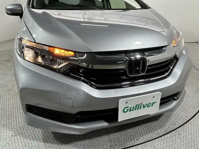 ホンダ シャトル ハイブリッド ホンダセンシング 大阪府 2020(令2)年 2.8万km ルナシルバーM 社外ナビ　衝突軽減ブレーキ　レーンアシスト　レーダークルーズコントロール　スマートキー　プッシュスタート　オートエアコン　ビルトインＥＴＣ　電動格納ミラー　Ｂｌｕｅｔｏｏｔｈ　横滑り防止装置　ｅｃｏｎ