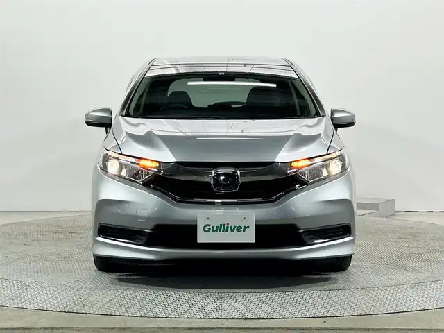 ホンダ シャトル ハイブリッド ホンダセンシング 大阪府 2020(令2)年 2.8万km ルナシルバーM 社外ナビ　衝突軽減ブレーキ　レーンアシスト　レーダークルーズコントロール　スマートキー　プッシュスタート　オートエアコン　ビルトインＥＴＣ　電動格納ミラー　Ｂｌｕｅｔｏｏｔｈ　横滑り防止装置　ｅｃｏｎ