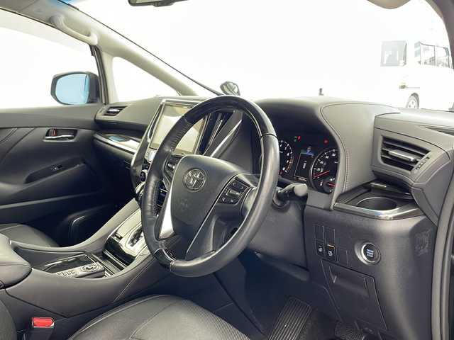 トヨタ ヴェルファイア Z Gエディション 兵庫県 2015(平27)年 6.7万km ブラック ・ALPINE10インチナビ&Bluetooth&DVD&CD&TV&SD/・バックカメラ/・ETC/・ALPINEリアフリップダウンモニター/・ステアリングスイッチ/・ステアリングヒーター/・クルーズコントロール/・電動パーキングブレーキ/・両側パワースライドドア/・レザーシート/・パワーシート/・モデリスタエアロ/・オットマン/・サンルーフ/・LEDヘッドライト/・オートライト/・横滑り防止装置/・盗難防止装置/・衝突被害軽減システム/・コーナーセンサー/・社外21インチアルミホイール/・純正フロアマット/・メモリシート（D席）/・カーテンエアバッグ/・Wエアバッグ/・プッシュスタートボタン/・アイドリングストップ/・ローダウン/・スマートキー